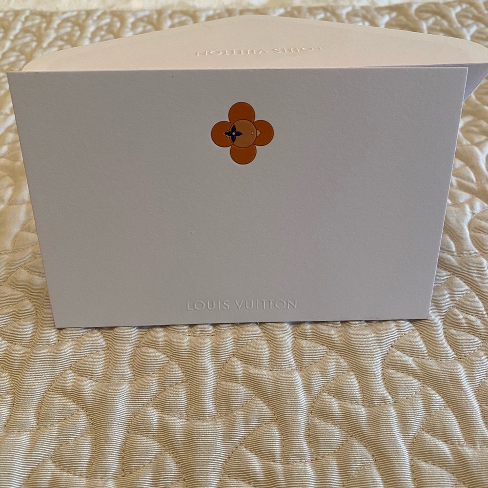 Louis Vuitton white card with Orange Flower